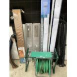 AN ASSORTMENT OF ITEMS TO INCLUDE BLINDS, FLOORING AND A HOSE PIPE REEL ETC