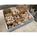 A LARGE QUANTITY OF WOODEN FURNITURE HANDLES AND KNOBS