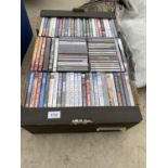AN ASSORTMENT OF DVDS AND CDS