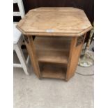 AN OAK THREE TIER OCCASIONAL TABLE WITH CANTED CORNERS, 19.5" SQUARE