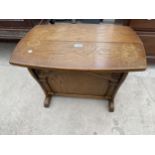 AN OAK FOLD-OVER SMALL TABLE TO REVEAL TWO DIVISION MAGAZINE RACK