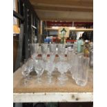 A QUANTITY OF GLASSES TO INCLUDE CHAMPAGNE FLUTES, SHERRY, PORT, TUMBLERS, ETC