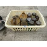 AN ASSORTMENT OF GLASS JARS AND STONE WARE VESSELS