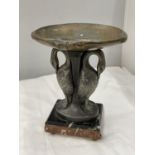 A METAL PEDESTAL DISH WITH SWAN DESIGN ON A MARBLE BASE 24CM HIGH