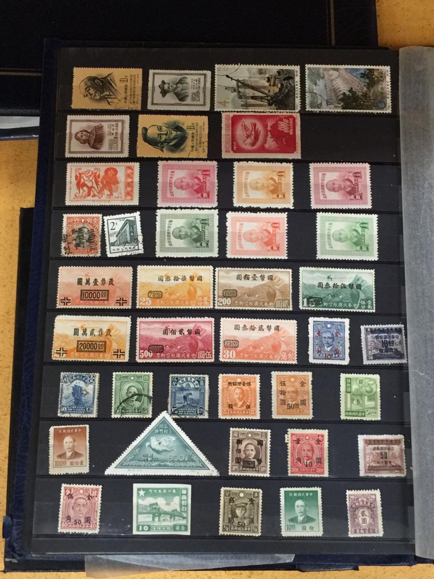 AN ALBUM CONTAINING RARE AND COLLECTABLE MOSTLY ASIAN STAMPS - Image 6 of 7