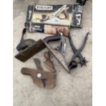 AN ASSORTMENT OF TOOLS TO INCLUDE WOOD PLANES AND A PUNCH ETC