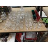A LARGE QUANTITY OF GLASSES TO INCLUDE DECANTER, PRESERVE POTS, WINE, SHERRY, PORT, ETC