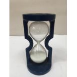 A 'VICTOR' BLUE CAST IRON THREE MINUTE EGG TIMER