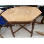 A VICTORIAN OAK HEXAGONAL TWO TIER CENTRE TABLE BEARING BROOKFIELD & WINDOWS FURNISHERS, STAFFORD