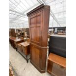 A 19TH CENTURY MAHOGANY FULL LENGTH TWO-DOOR CORNER CUPBOARD, 33" WIDE