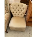 A MODERN BUTTON BACK BEDROOM CHAIR