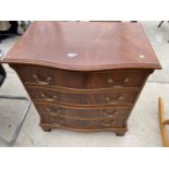 A REPRODUCTION SERPENTINE FRONT CHEST OF FOUR DRAWERS, 28" WIDE