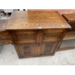 AN OAK WEBBER FURNITURE ANTIQUE STYLE CABINET, 32" WIDE