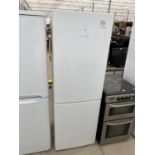 A WHITE BOSCH UPRIGHT FRIDGE FREEZER