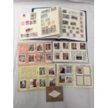 A PELHAM STAMP ALBUM AND FIVE SMALL STAMP ALBUMS CONTAINING GB AND WORLD STAMPS