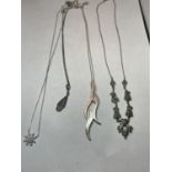 FOUR MARKED SILVER NECKLACES WITH PENDANTS