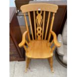 A VICTORIAN STYLE FARMHOUSE ROCKING CHAIR