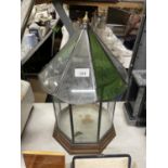 A GLASS AND METAL OCTAGONAL TERRARIUM HEIGHT APPROX 46CM, WIDTH APPROX 30CM