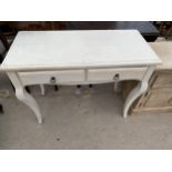 A WHITE PAINTED TWO DRAWER SIDE TABLE, 39" WIDE
