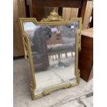 A MODERN GILT EFFECT WALL MIRROR