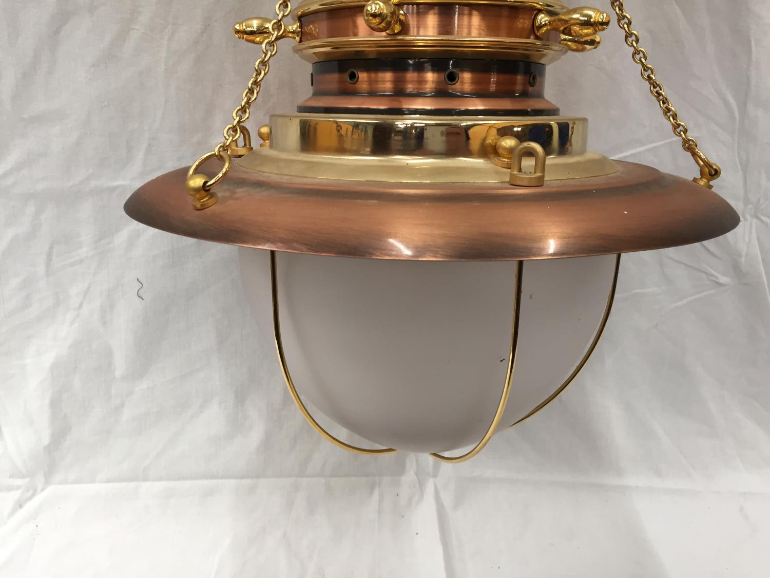 AN UNUSUAL BRASS AND COPPER PENDANT LIGHT WITH DOMED GLASS SHADE, SHIPS WHEEL DESIGN AND CHAINS - Image 6 of 6