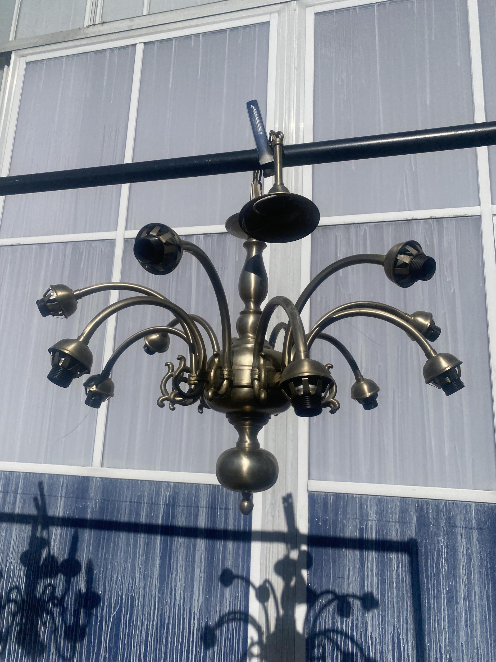 A TWELVE BRANCH CHANDELIER STYLE LIGHT FITTING