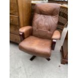 AN IKEA FAUX LEATHER SWIVEL CHAIR