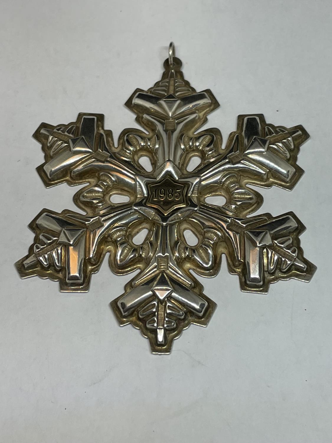 A GORHAM STERLING SILVER 1985 SNOWFLAKE GOLD FILLED