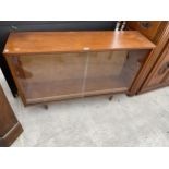 A RETRO TEAK AVALON TWO-DOOR SLIDING BOOKCASE, 45" WIDE