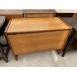 A RETRO TEAK RECORD CABINET, 35" WIDE