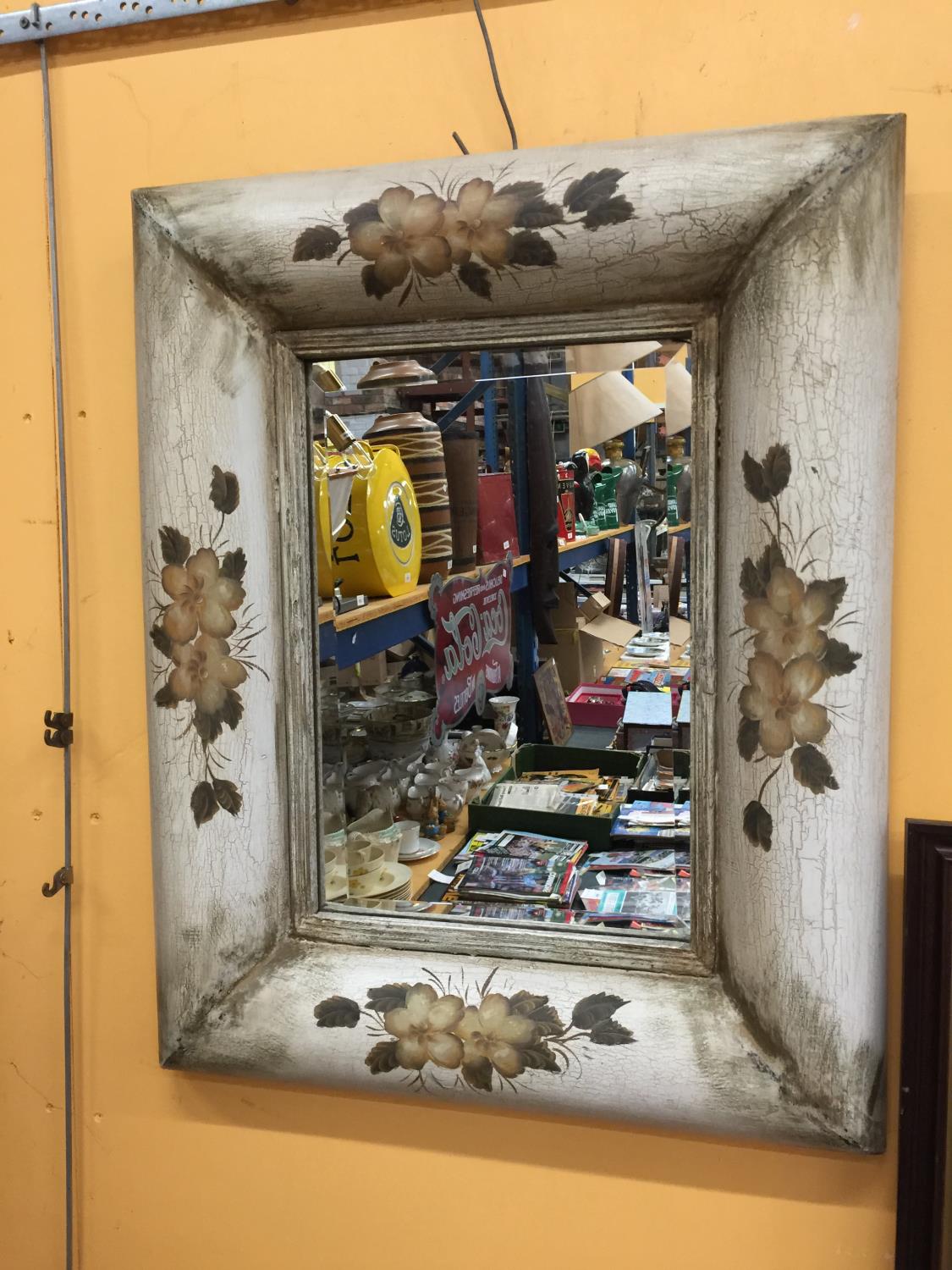 A LARGE BEVELLED GLASS MIRROR WITH WOODEN VINTAGE FRAME DECORATED WITH FLOWERS APPROX 76CM X 63CM - Image 2 of 2