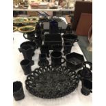 A COLLECTION OF BLACK GLASS TO INCLUDE A PLANTER, VASES, JUGS, BOWLS, ETC