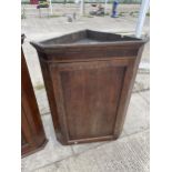 A GEORGE III OAK CORNER CUPBOARD WITH SHAPED INTERIOR SHELVES, 30" WIDE