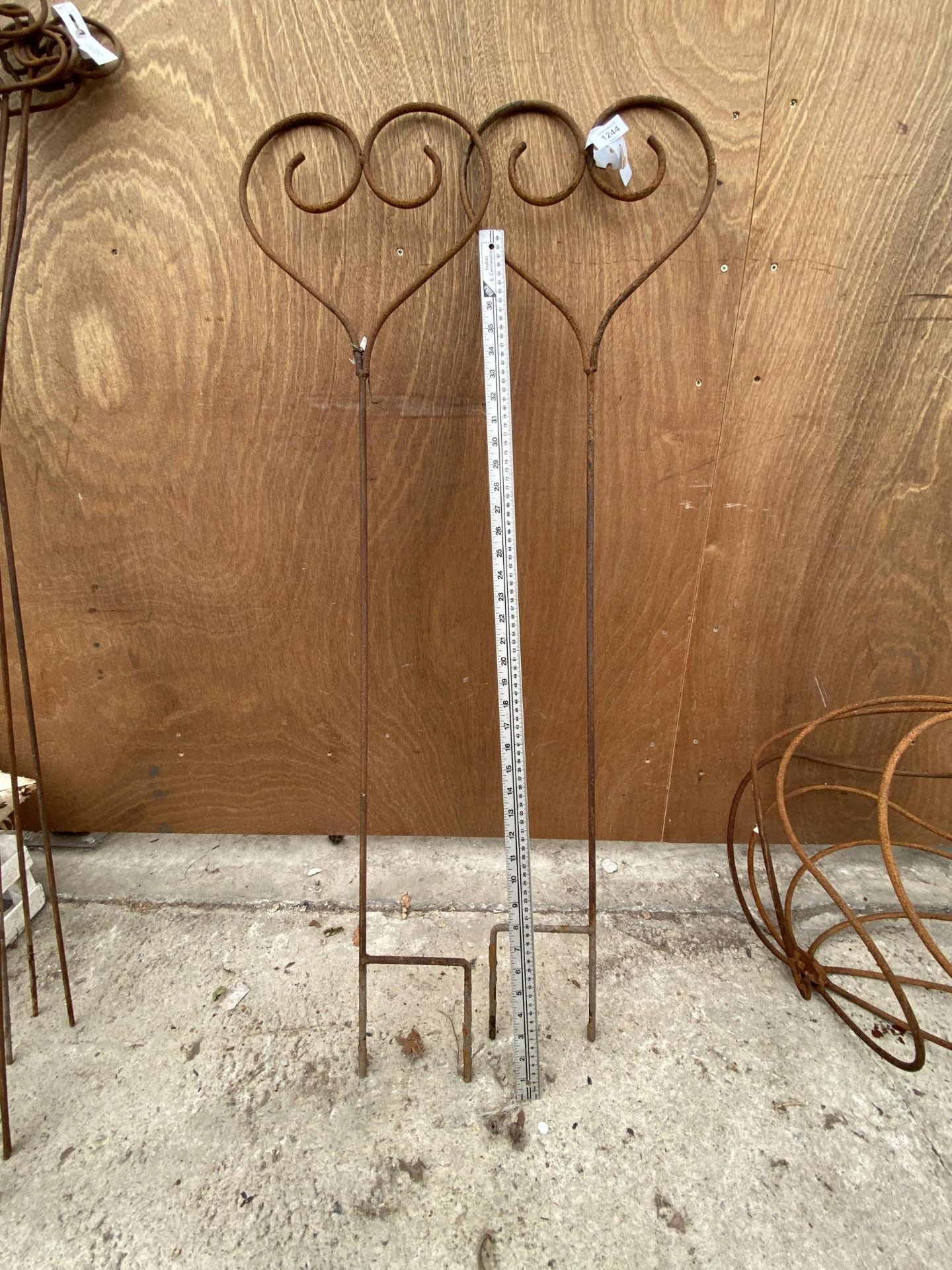 A PAIR OF SMALL HEART SHAPED WROUGHT IRON PLANT SUPPORTS/GARDEN FEATURES - Image 2 of 3