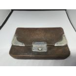 A LEATHER PURSE WITH HALLMARKED LONDON SILVER CORNERS AND CLASP