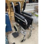 A FOLDING WHEEL CHAIR