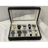 TWELVE VARIOUS WATCHES IN A PRESENTATION BOX TO INLCUDE TWO SKAGEN, A JAGUAR, DKNY ETC