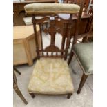 A VICTORIAN MAHOGANY PRIE DIEU CHAIR WITH CRUCIFIX EMBELLISHED BACK