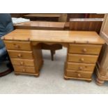 A MODERN PINE KNEEHOLE DRESSING TABLE, 52" WIDE