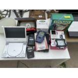 AN ASSORTMENT OF ITEMS TO INCLUDE A PORTABLE DVD PLAYER, RADIOS AND GAMES ETC