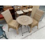 A WICKER BISTRO TABLE ON METAL FRAME AND A PAIR OF WICKER CHAIRS
