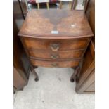 A MINIATURE WALNUT AND CROSSBANDED CHEST OF THREE DRAWERS ON CABRIOLE LEGS