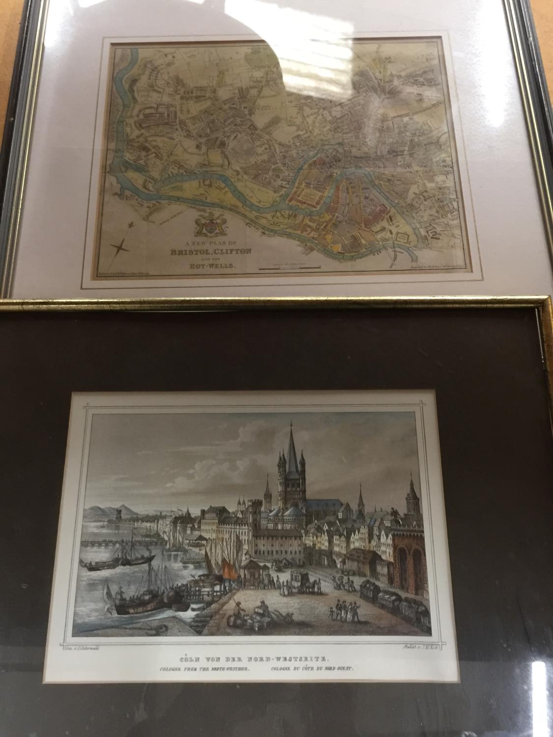 A FRAMED PRINT OF COLOGNE FROM THE NORTH WESTSIDE AND A FRAMED PRINT OF A MAP OF BRISTOL, CLIFTON