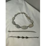 THREE SILVER ITEMS TO INCLUDE A NECKLACE WITH PEARLISED STONES AND TWO BRACELETS