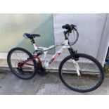 A GENTS AMIGO MOUNTAIN BIKE WITH FRONT AND REAR SUSPENSION AND AN 18 SPEED GEAR SYSTEM