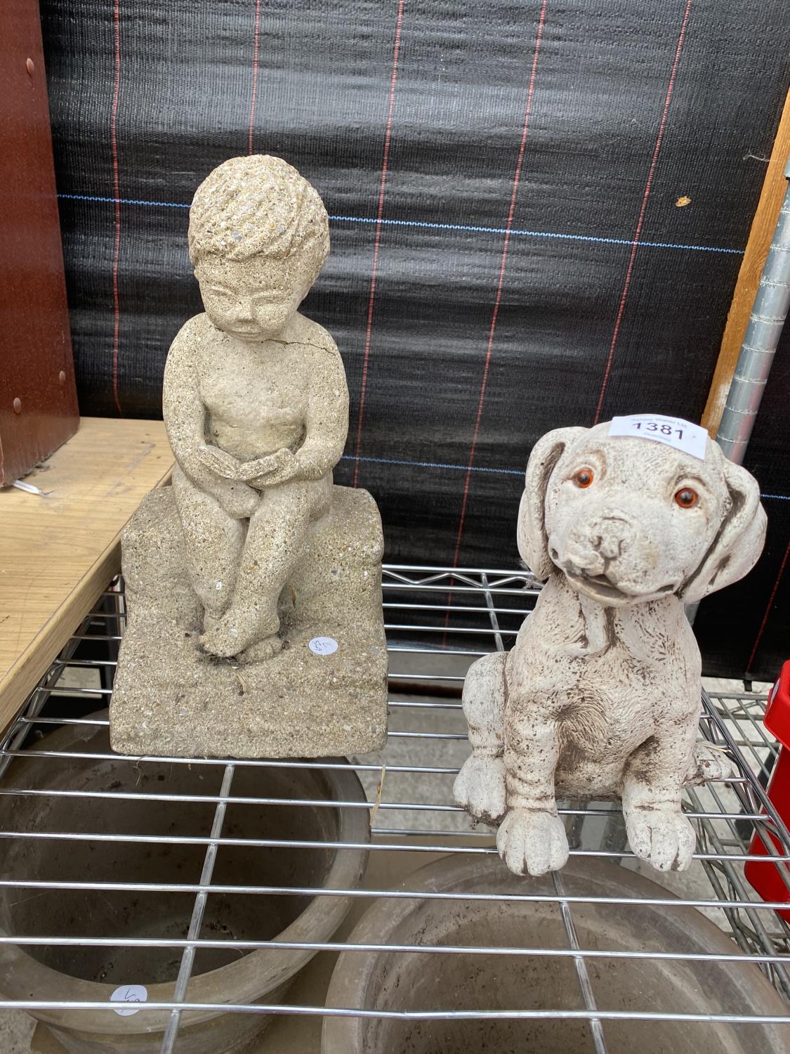 A CAST STONE CHERUB FIGURE, A PAIR OF PLANT POTS AND A CAST STONE DOG FIGURE