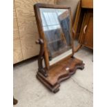 A VICTORIAN MAHOGANY SWING FRAME DRESSING MIRROR