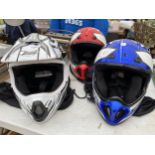 THREE VARIOUS MOTOR CYCLE HELMETS