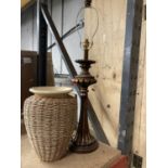 A LARGE VINTAGE STYLE LAMP BASE HEIGHT APPROX 47CM AND A VASE 'IN A BASKET'