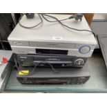 AN ASSORTMENT OF VHS PLAYERS TO INCLUDE JVC AND DAEWOO ETC